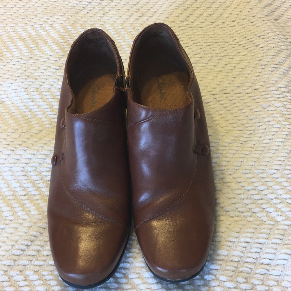 Brown Clark’s booties.